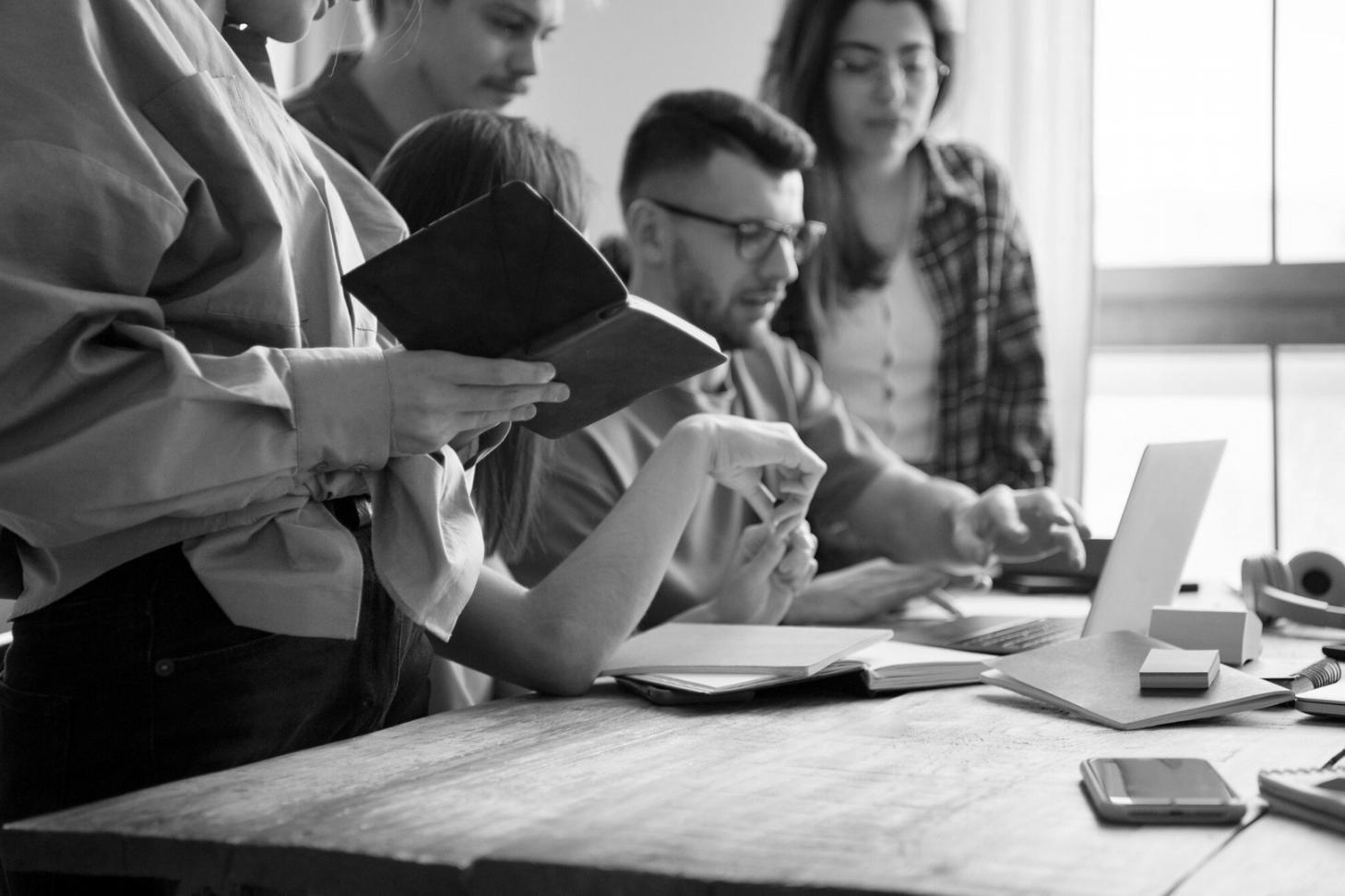 Mobile game marketing team collaborating on campaign strategy