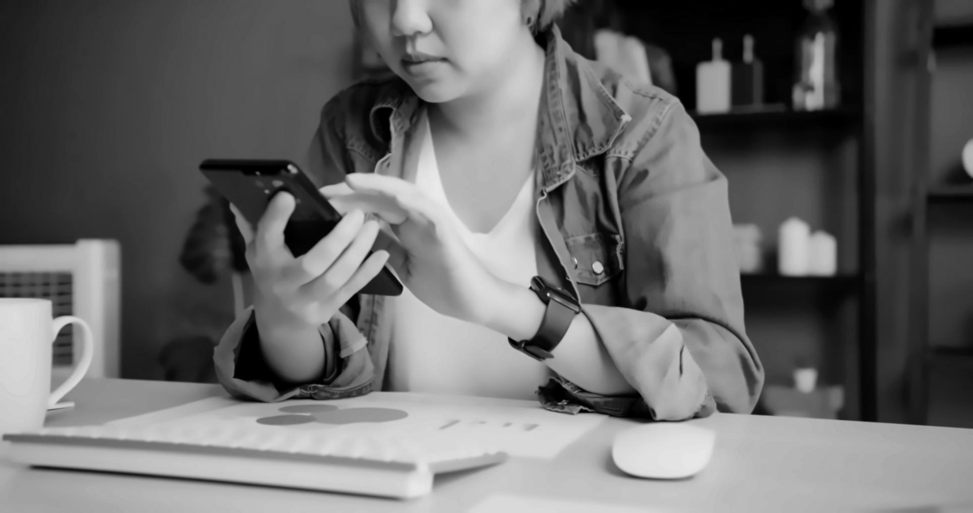 Student analyzing mobile game user acquisition metrics and campaign performance data